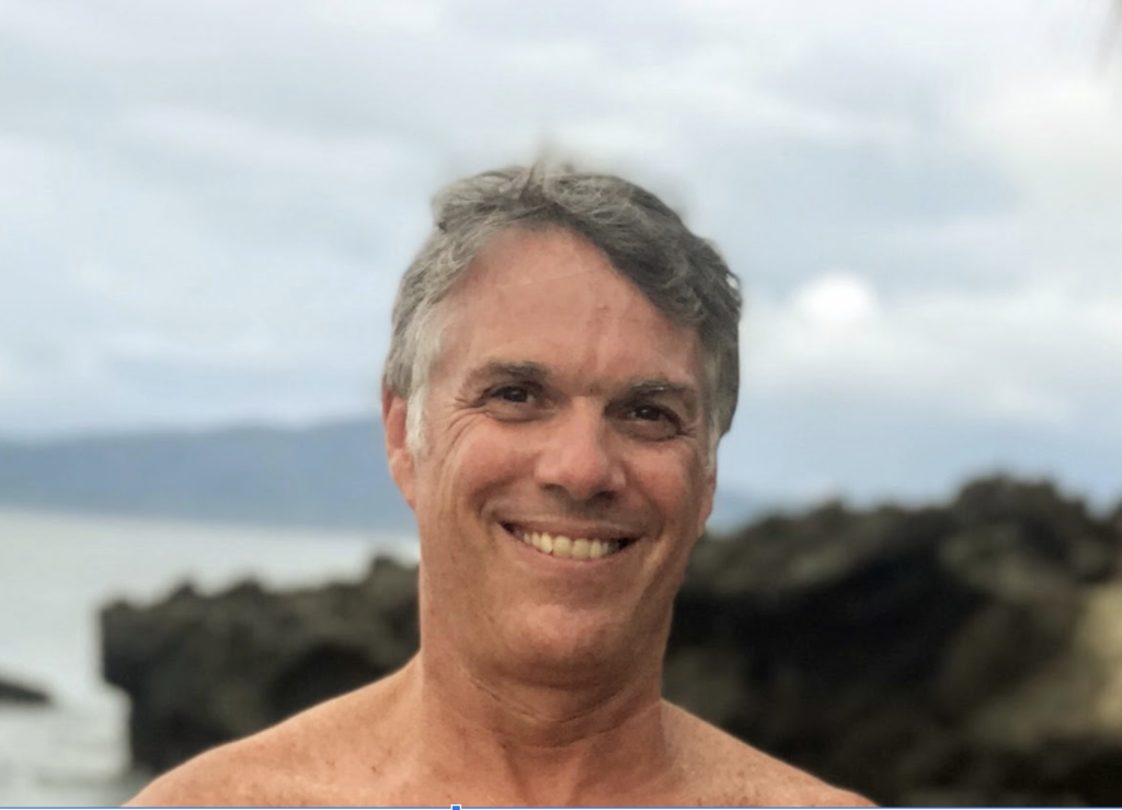 smiling man - owner of big air travel - captain jeremy