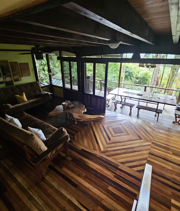 living room and terrace in the jungle, wooden floor